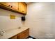 Bathroom featuring cabinet sink combo and tiled walls at 830 Cabaniss Dr, Shelby, NC 28150