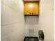 Bathroom featuring cabinet, dispenser, and tiled walls at 830 Cabaniss Dr, Shelby, NC 28150