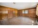 Paneled bedroom with a closet and two windows, offering a cozy and private space at 830 Cabaniss Dr, Shelby, NC 28150