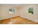 Comfortable bedroom with windows offer natural light and hardwood floors, cozy and inviting at 830 Cabaniss Dr, Shelby, NC 28150