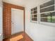 Entryway with brick, siding, window, and tile flooring at 830 Cabaniss Dr, Shelby, NC 28150