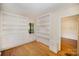 Bright living room with built-in shelves and hardwood floors offer both style and functionality at 830 Cabaniss Dr, Shelby, NC 28150