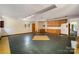Room with painted floors, natural light, and built-in cabinets, ready for a remodel at 830 Cabaniss Dr, Shelby, NC 28150