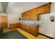 Room with vintage cabinets, painted floors, and a fire extinguisher, perfect for a creative makeover at 830 Cabaniss Dr, Shelby, NC 28150