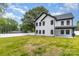 Large backyard with green grass and a white fence surrounding the property at 9527 Walkers Ferry Rd, Charlotte, NC 28214