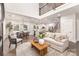 Open living space with hardwood floors, seamlessly connecting the living, dining, and kitchen areas at 9527 Walkers Ferry Rd, Charlotte, NC 28214