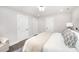 Main bedroom featuring a queen bed, hardwood floors, and recessed lighting at 9527 Walkers Ferry Rd, Charlotte, NC 28214