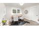 Bright home office featuring a desk, chairs, and natural light from the windows at 9527 Walkers Ferry Rd, Charlotte, NC 28214