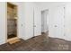 Bright hallway with a walk-in shower and tile flooring at 1007 Wessington Manor Ln, Fort Mill, SC 29715