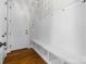 Inviting mud room with custom built-in bench, hooks, and ample storage space at 1007 Wessington Manor Ln, Fort Mill, SC 29715