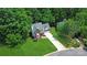 Beautiful aerial view of home with verdant lawn, mature trees, and inviting curb appeal at 101 Creekside Dr, Fort Mill, SC 29715
