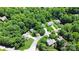 Gorgeous aerial view showcasing the community with tree-lined streets and well-kept yards at 101 Creekside Dr, Fort Mill, SC 29715