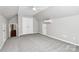 This bedroom has neutral walls, carpet, a window with blinds, and an attic ceiling at 101 Creekside Dr, Fort Mill, SC 29715
