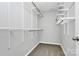 Walk-in closet features carpet and wire shelving and is ready for organization at 101 Creekside Dr, Fort Mill, SC 29715