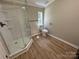 Contemporary bathroom featuring a sleek glass-enclosed shower and modern fixtures, providing a spa-like experience at 1016 Old Thompson Ave, Lancaster, SC 29720
