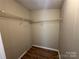 Walk-in closet with wire shelving for optimal storage of clothes and accessories at 1016 Old Thompson Ave, Lancaster, SC 29720