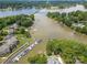 Stunning aerial view of the lake and surrounding community, showcasing the waterfront access and lush greenery at 104 Pier 33 Dr # 311, Mooresville, NC 28117