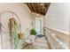 Inviting outdoor space with potted plants, cozy seating, and natural lighting at 104 Pier 33 Dr # 311, Mooresville, NC 28117
