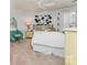 Cozy bedroom featuring modern decor, natural light, and a comfortable bed at 104 Pier 33 Dr # 311, Mooresville, NC 28117