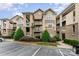 Well-maintained condo building with manicured landscaping and ample parking at 104 Pier 33 Dr # 311, Mooresville, NC 28117