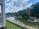 Picturesque waterfront view featuring a private boat dock with ample boat parking at 104 Pier 33 Dr # 311, Mooresville, NC 28117