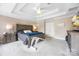 Spacious main bedroom features a trey ceiling, carpeted floors and neutral tones at 10452 Quiet Bay Ct, Charlotte, NC 28278