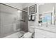 Modern bathroom featuring a glass-enclosed shower with white tiles and a toilet at 1102 Sugar Creek Rd, Indian Land, SC 29707