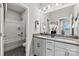 Bathroom with double sinks, a gray countertop, and a tiled shower and tub at 1102 Sugar Creek Rd, Indian Land, SC 29707