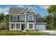 Charming two-story home with gray siding, black shutters, and a well-manicured front lawn at 1102 Sugar Creek Rd, Indian Land, SC 29707