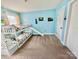 The bedroom features a bunk bed with a slide, and light blue painted walls at 112 Paradise Hills Cir, Mooresville, NC 28115