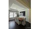 Elegant dining room with a large table and ample natural light, perfect for gatherings at 112 Paradise Hills Cir, Mooresville, NC 28115