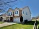 Two story home with brick and siding, features a well kept lawn and attached garage at 112 Paradise Hills Cir, Mooresville, NC 28115