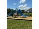 A new playground on a manicured lawn at 112 Paradise Hills Cir, Mooresville, NC 28115