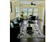 Inviting sunroom with ample natural light, stylish furnishings, and a view of the outdoors at 112 Paradise Hills Cir, Mooresville, NC 28115