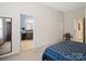 Bedroom with ensuite bathroom and a view to a decorated table near the door at 11332 Ridge Oak Dr, Charlotte, NC 28273