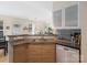 Kitchen features stainless steel appliances, sleek cabinetry, and convenient breakfast bar area at 11332 Ridge Oak Dr, Charlotte, NC 28273