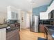 Bright kitchen with stainless appliances, modern cabinets, and easy access to adjacent rooms at 11332 Ridge Oak Dr, Charlotte, NC 28273