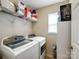 Laundry room with modern washer and dryer and plenty of storage space at 11332 Ridge Oak Dr, Charlotte, NC 28273