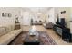 Inviting living room with ample seating, light wood floors, and stylish decor throughout at 11332 Ridge Oak Dr, Charlotte, NC 28273