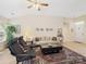 Spacious living room with large rug, comfortable seating, and bright natural light at 11332 Ridge Oak Dr, Charlotte, NC 28273