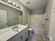 Bathroom with updated vanity, large mirror, and a shower-tub combination at 1176 Constitution Park Blvd, Rock Hill, SC 29732