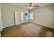 Neutral bedroom with ceiling fan and carpet at 1176 Constitution Park Blvd, Rock Hill, SC 29732