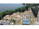Aerial view of tennis courts and walking trails next to a large lake at 1360 Dali Blvd, Mount Holly, NC 28120