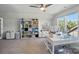 Expansive bonus room featuring neutral carpet and ample natural light from two large windows at 1360 Dali Blvd, Mount Holly, NC 28120