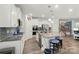 Spacious kitchen features granite countertops, a large island with seating, and stainless steel appliances at 1360 Dali Blvd, Mount Holly, NC 28120