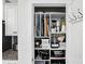 Organized pantry features custom shelving with baking sheets, cooking accessories, and small appliances at 1360 Dali Blvd, Mount Holly, NC 28120