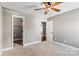 Bedroom featuring gray walls, carpet, ceiling fan, and closet at 1560 Springlake Rd, York, SC 29745