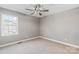 Bedroom featuring gray walls, carpet, ceiling fan, and window at 1560 Springlake Rd, York, SC 29745