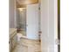 Stylish bathroom featuring a glass-enclosed shower, marble-look tile flooring, and modern fixtures at 1817 Augustine St, Monroe, NC 28112