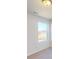 Bedroom with plush carpet and one large window overlooking the surrounding landscape at 1817 Augustine St, Monroe, NC 28112